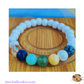 Votre bracelet les 7 chakras en 8mm, pierres en bois en finition